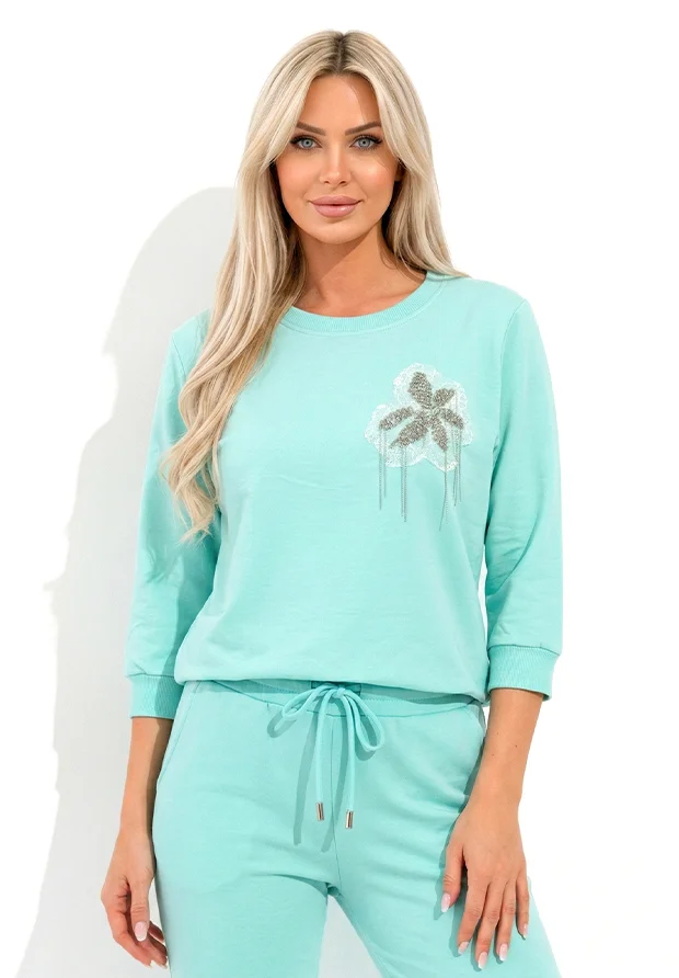 MEGI AQUA BLUZA / KORONKOWY KWIAT WYKOŃCZONY ŁAŃCUSZKAMI / B1401