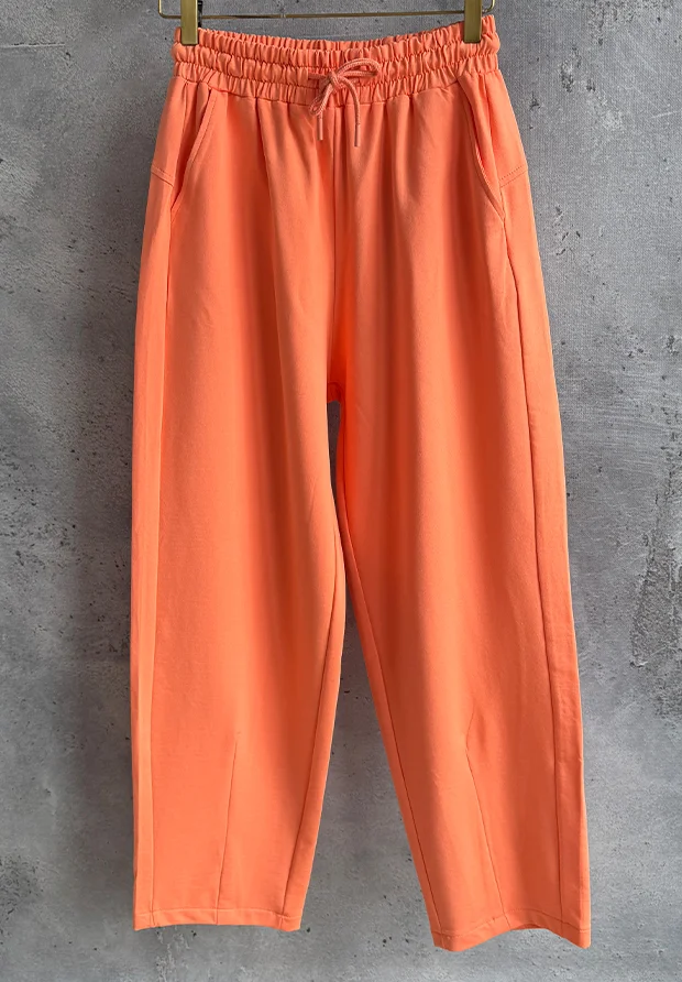 MEGI MANDARYNKOWE SPODNIE Z ZASZEWKAMI NA NOGAWKACH / P2843