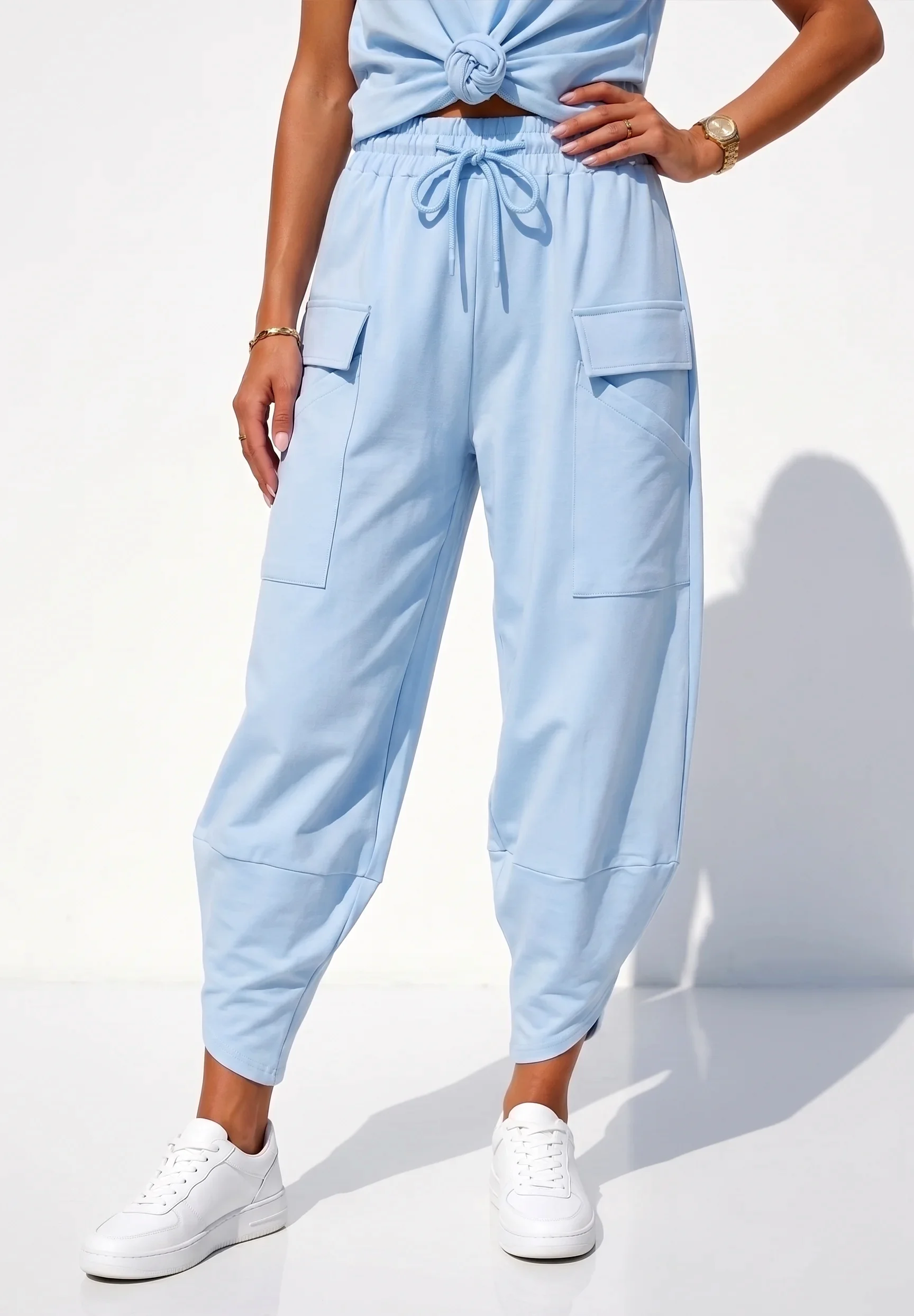 MEGI JASNO NIEBIESKIE SPODNIE TULIPANY Z PATKAMI / P1207